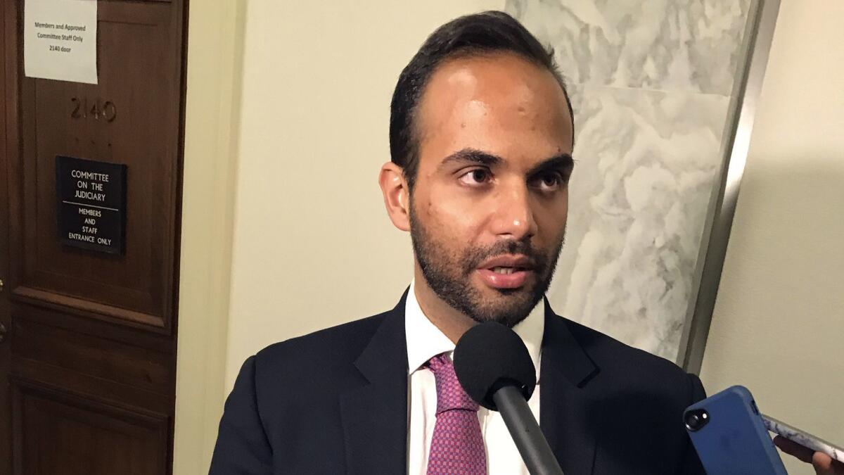George Papadopoulos talks to reporters on Capitol Hill on Oct. 25.