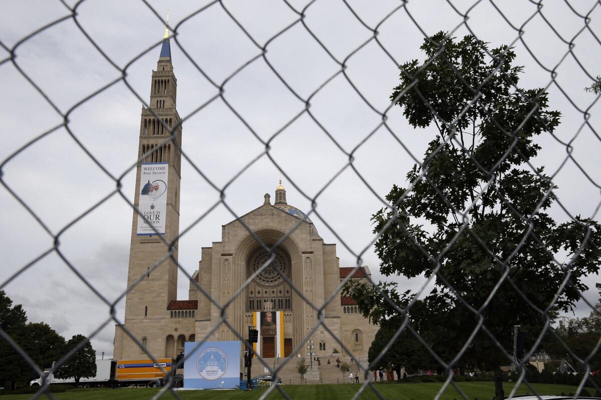 Security fences surround The Basilica of the National Shrine of the Immaculate Conception in Washington, Tuesday, Sept. 22, 2015, in preparation for the upcoming visit by Pope Francis. (Alex Brandon / Associated Press)