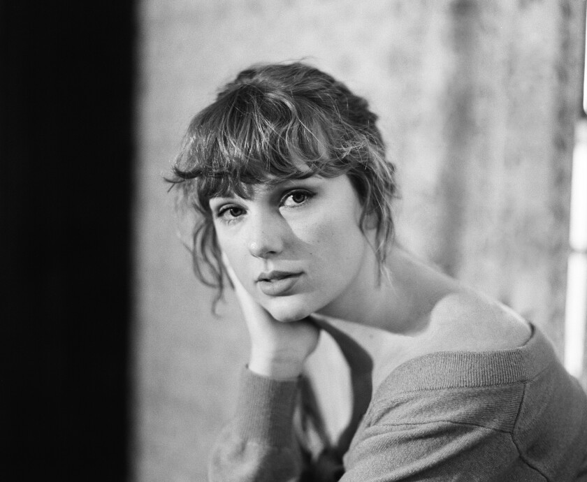 Taylor Swift is favored to win the Grammy for album of the year, for "Folklore."