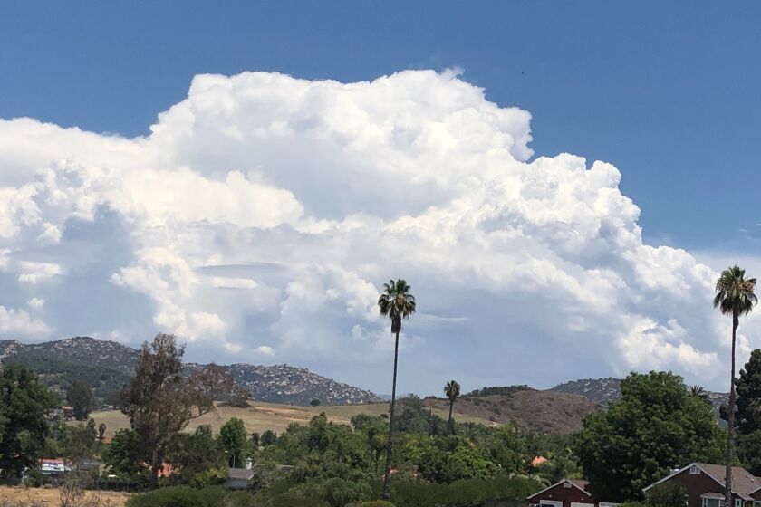 A thunderstorm, which reached 45,000 feet high, towered over northern San Diego County Monday afternoon. The weather service later issued a severe thunderstorm warning for the storm.