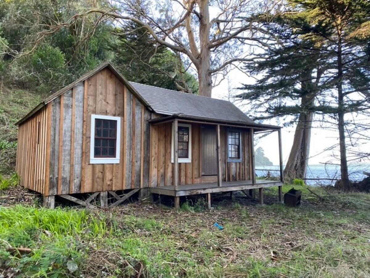 A small wooden house in the woods