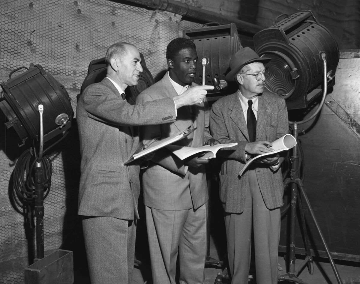Jackie Robinson, Joe Nadel, and Al Green on the set of "The Jackie Robinson Story"