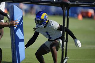  Rams cornerback Derion Kendrick (1) runs a drill.