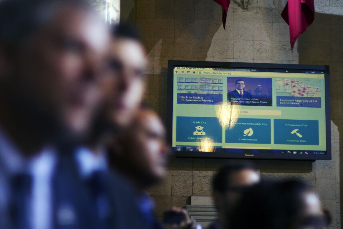 Mayor Eric Garcetti unveils the new city website during Hackathon, which took place at City Hall in Los Angeles this weekend.