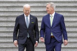 FILE - President Joe Biden and House Speaker Kevin McCarthy of Calif., walk down the House steps after attending an annual St. Patrick's Day luncheon gathering, Friday, March 17, 2023, on Capitol Hill in Washington. (AP Photo/Mariam Zuhaib, File)