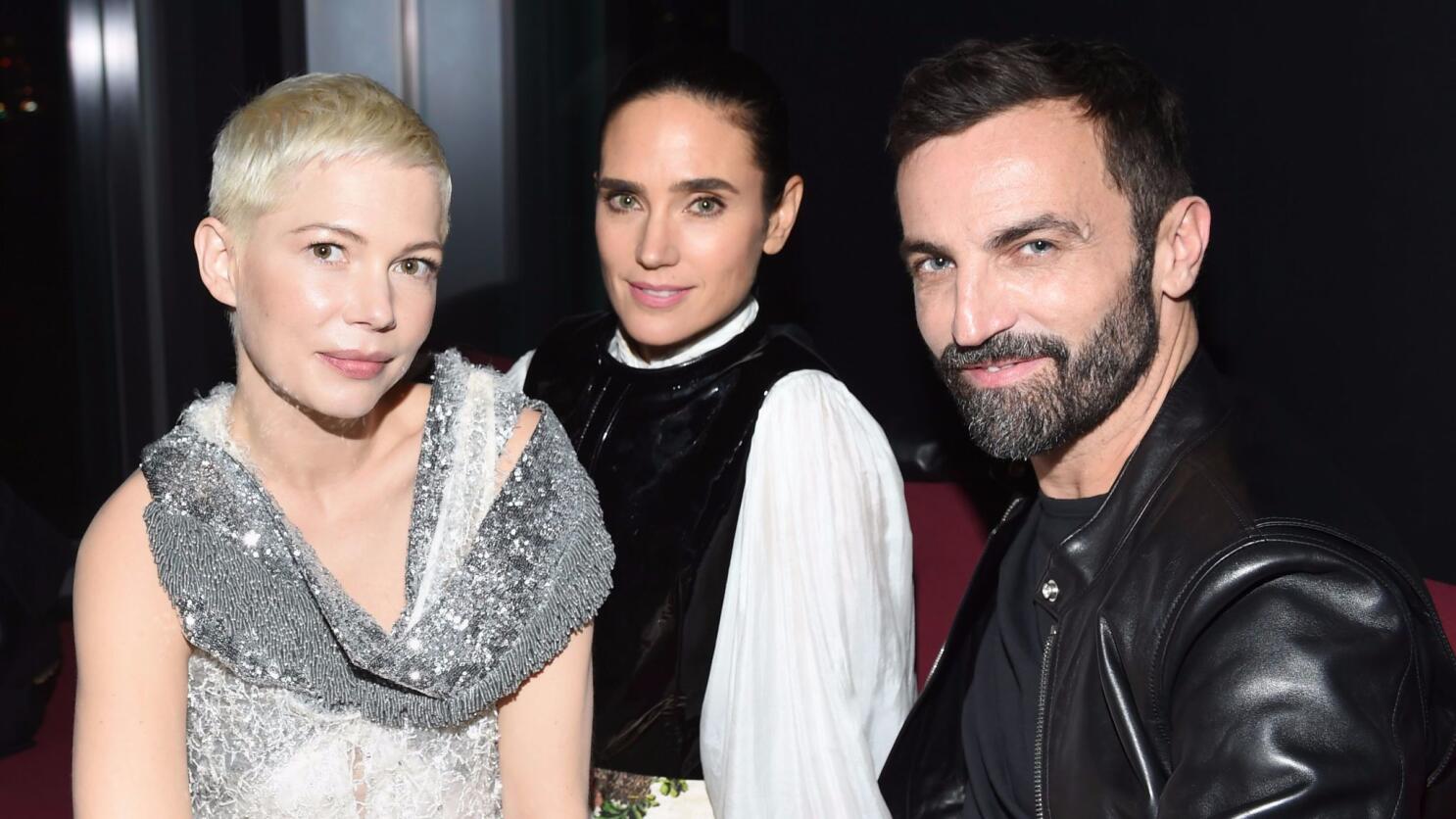 Justin Theroux poses with Nicolas Ghesquiere after the Louis
