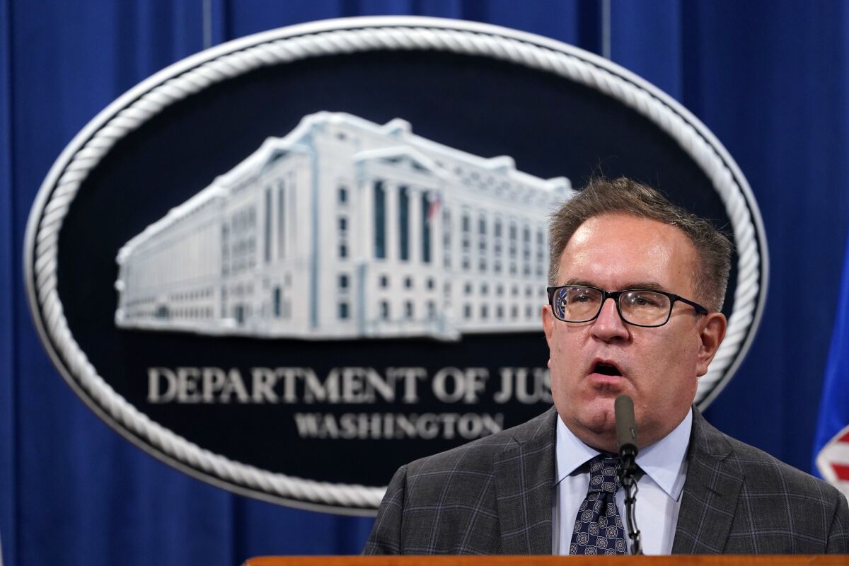 FILE - Environmental Protection Agency (EPA) Administrator Andrew Wheeler speaks, during a news conference at the Justice Department in Washington, on Sept. 14, 2020. Republican Virginia Gov.-elect Glenn Youngkin has tapped the former coal lobbyist and Trump administration Environmental Protection Agency chief to join his cabinet in a role overseeing the state’s environmental policy. Youngkin's transition announced Wednesday, Jan. 5, 2022, that Wheeler is his pick for secretary of natural resources. (AP Photo/Susan Walsh, Pool, File)