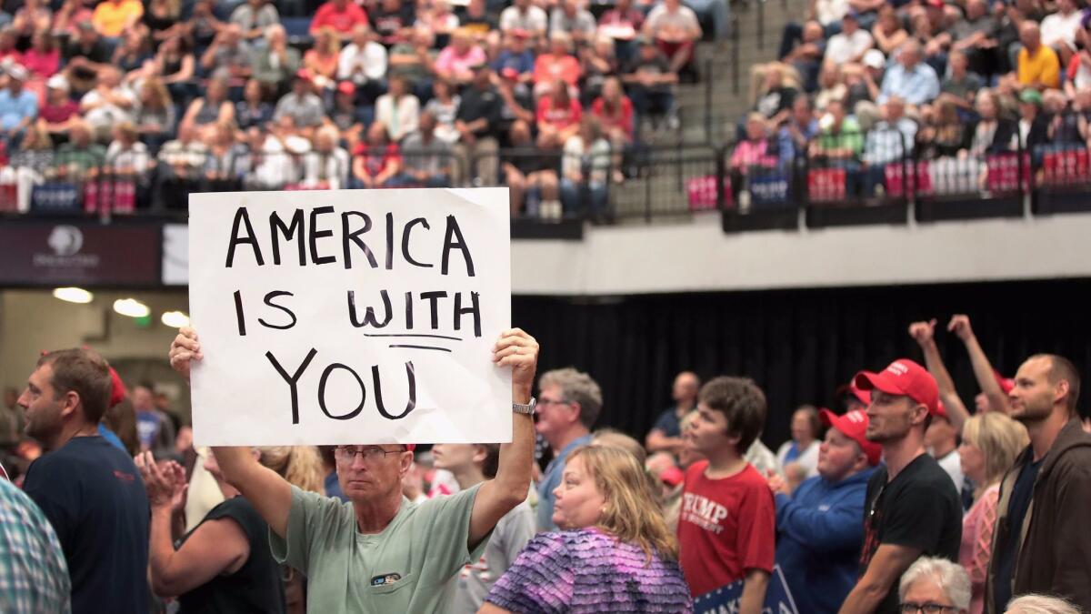 Supporters of President Trump attend a June 21, 2017, rally in Cedar Rapids, Iowa.