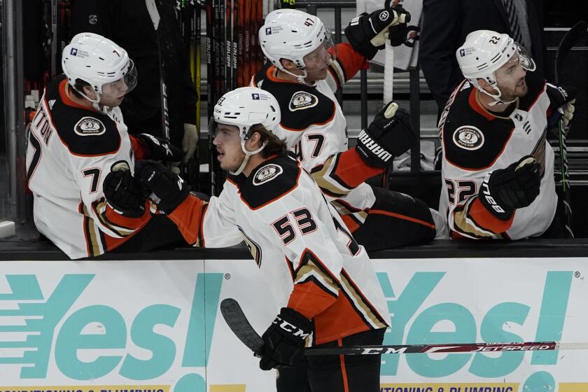 Anaheim Ducks left wing Max Comtois (53) celebrates after scoring against Vegas Golden Knights during the third period of an NHL hockey game Thursday, Feb. 11, 2021, in Las Vegas. (AP Photo/John Locher)