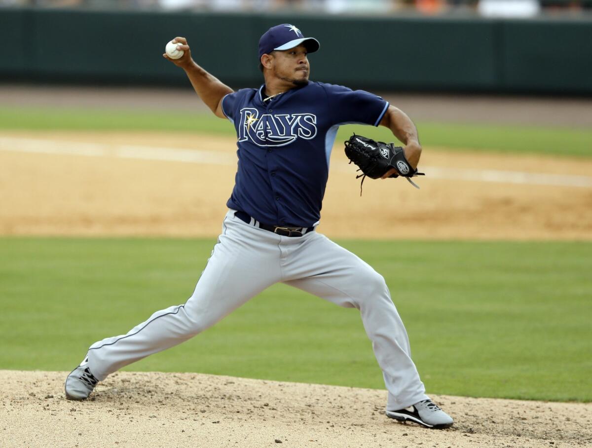 Reliever Joel Peralta was acquired by the Dodgers from the Tampa Bay Rays as part of a four-player trade announced Thursday.
