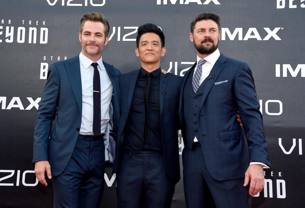 From left, Chris Pine, John Cho and Karl Urban.