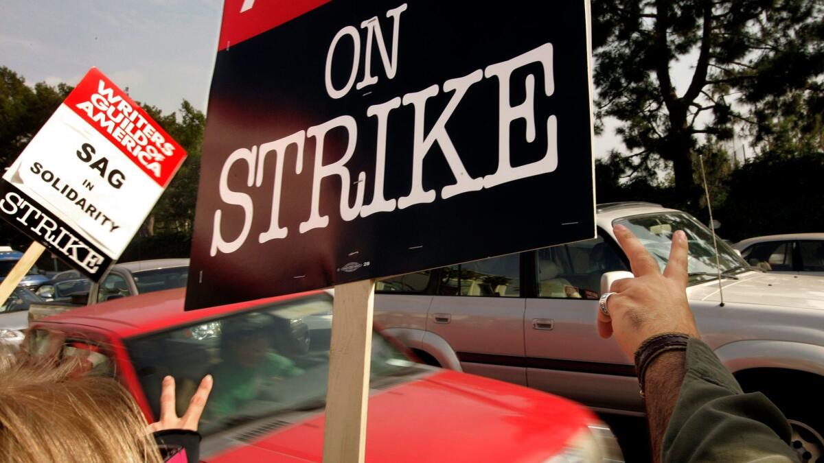 Supporters and members of the Writers Guild of America protest in Los Angeles in 2007.