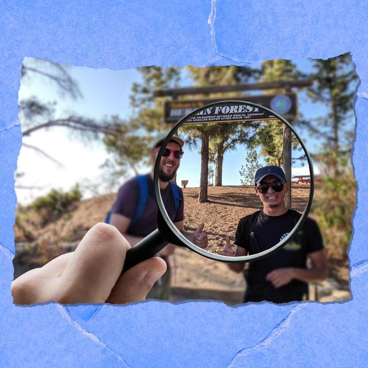 Two people and a forest sign are seen through a magnifying lens.
