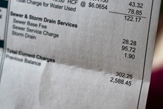 SAN DIEGO, CA - MARCH 30: Joni Low's very large water, sewer, and storm drain bill from the City of San Diego Public Utilities Department for her Scripps Ranch home. Photographed March 30, 2023. (Howard Lipin / For The San Diego Union-Tribune)