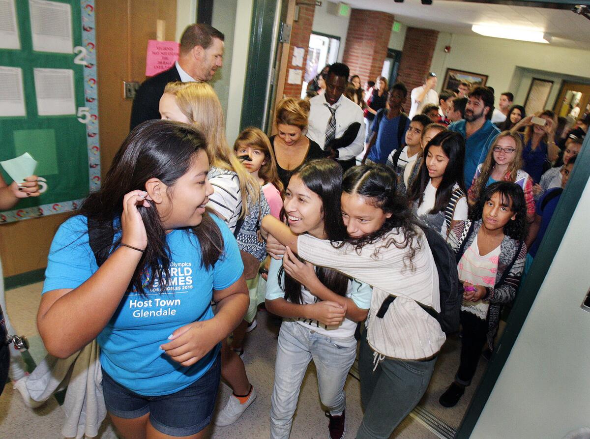 John Muir Middle School students make their way to their lockers on the first day of school in this file photo taken on Monday, AUg. 17, 2015.