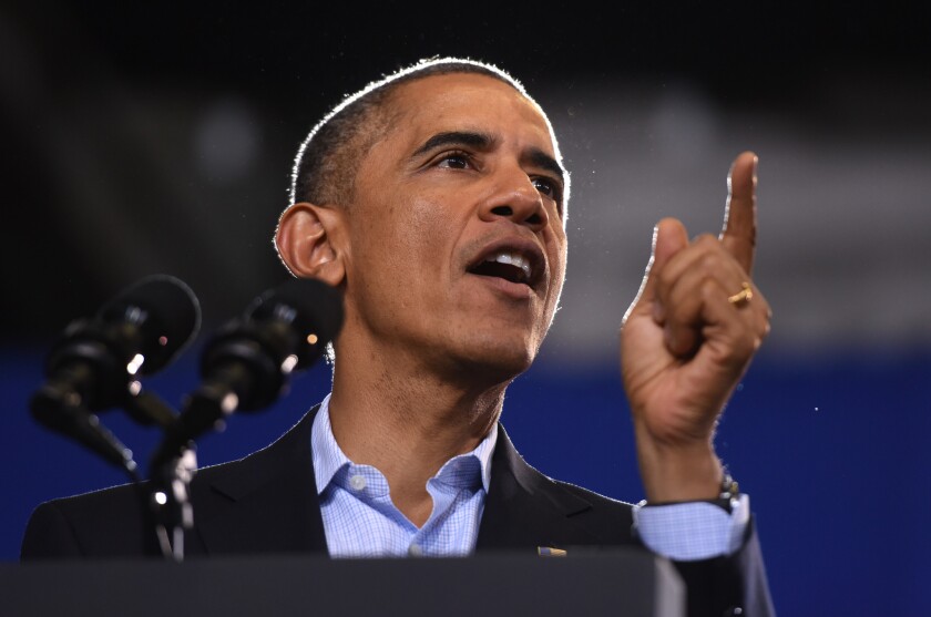 President Obama speaks at a campaign rally in Bridgeport, Conn., two days before the midterm election. A leading Democratic pollster says the president's talk of economic recovery during the campaign made him seem "out of touch" with voters' lives.