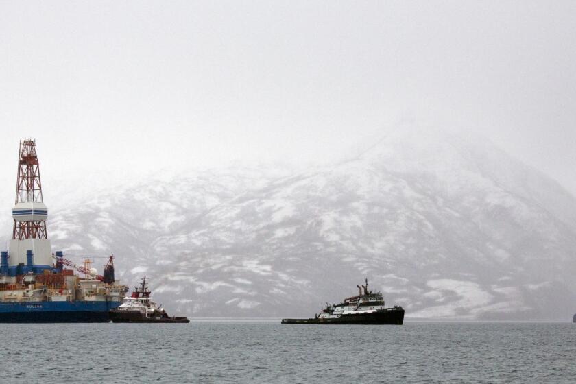 Salvage teams conduct an assessment of Shell's Kulluk drill barge in January 2013 off Alaska's Kodiak Island. Environmentalists have been concerned about the potential effects of drilling in the region.