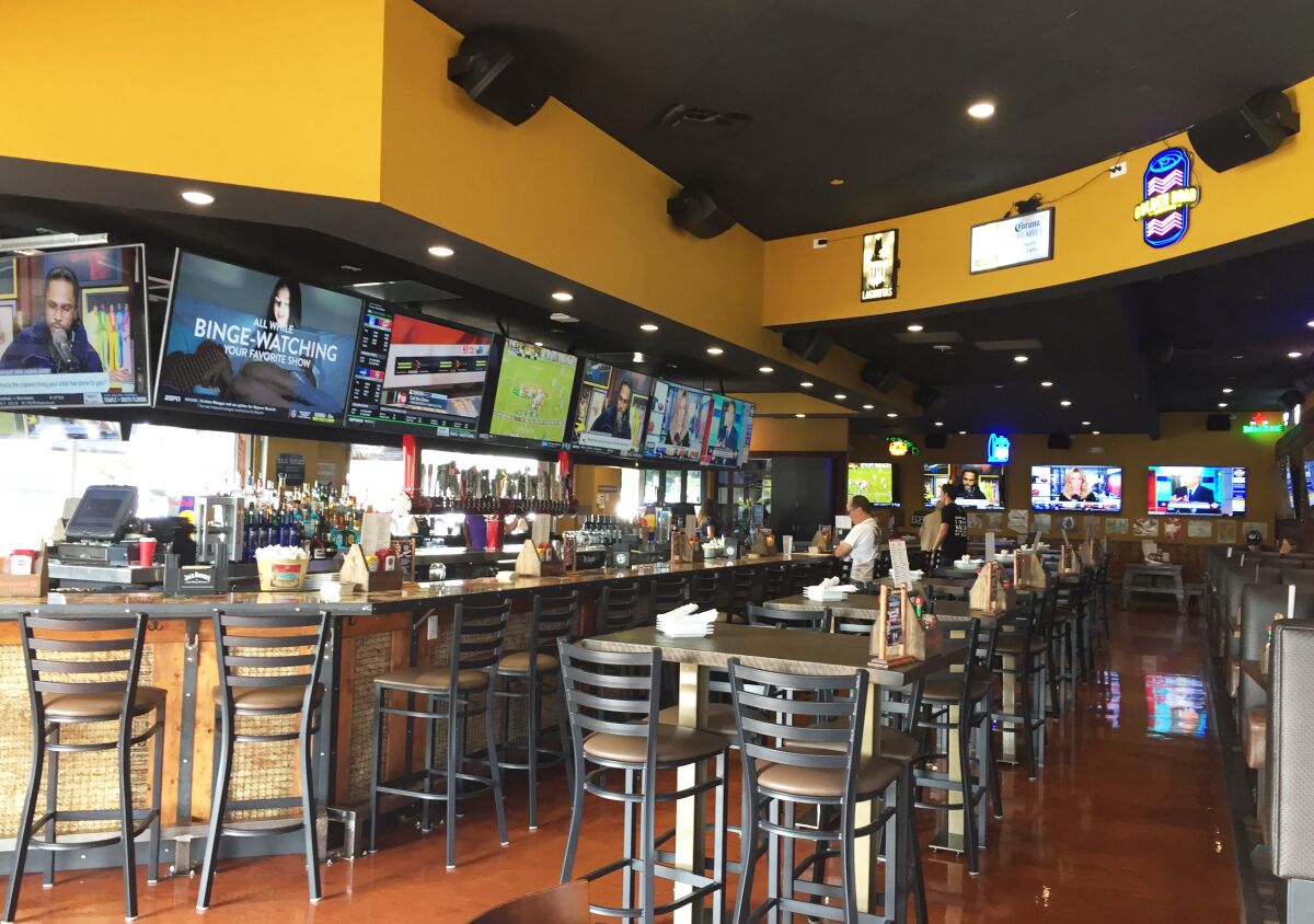 Interior of the new Cold Beers & Cheeseburgers sports pub restaurant that opened Oct. 29 in Carlsbad Village.