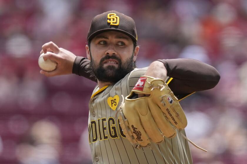 San Diego Padres starting pitcher Matt Waldron throws in the first inning of a baseball game against the Cincinnati Reds, Thursday, May 23, 2024, in Cincinnati. (AP Photo/Carolyn Kaster)