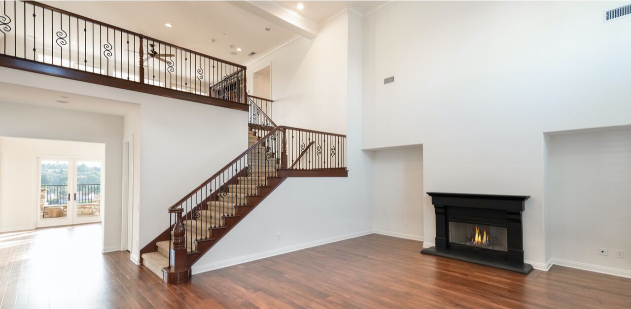 A staircase in the spacious great room leads to an open second story.