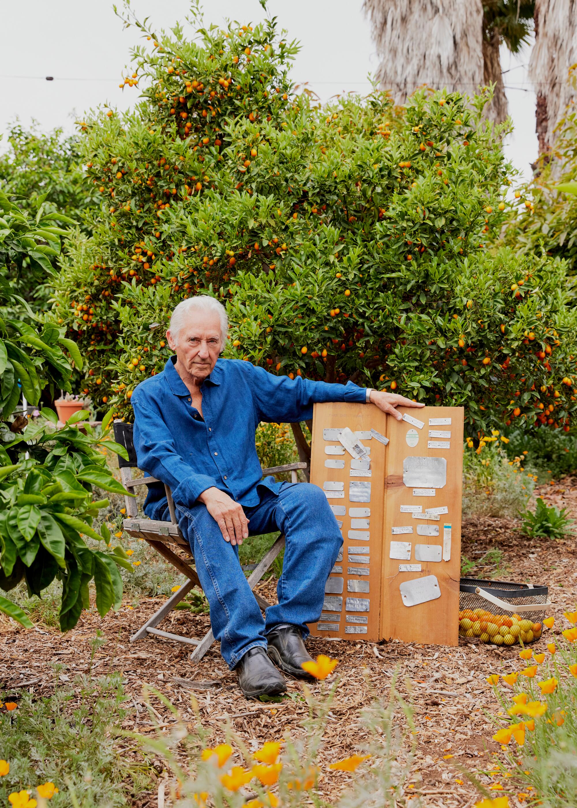 With his all-blue outfit and bright white hair and eyebrows, Ruscha has his own magic laciness about him.