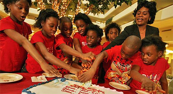 The first live birth of octuplets in the U.S. happened in Houston, Texas in 1998. From left, Ebuka, Echerem, Jioke, Chima, Gorom, Chidi, Ikem and Favor, the seven surviving octuplets, celebrate their 10th birthday. Their mother, Nkem Chukwu, looks on. RELATED Octuplets' mother already has twins, four other children Discuss: L.A. Now Video: Mom already has 6 children
