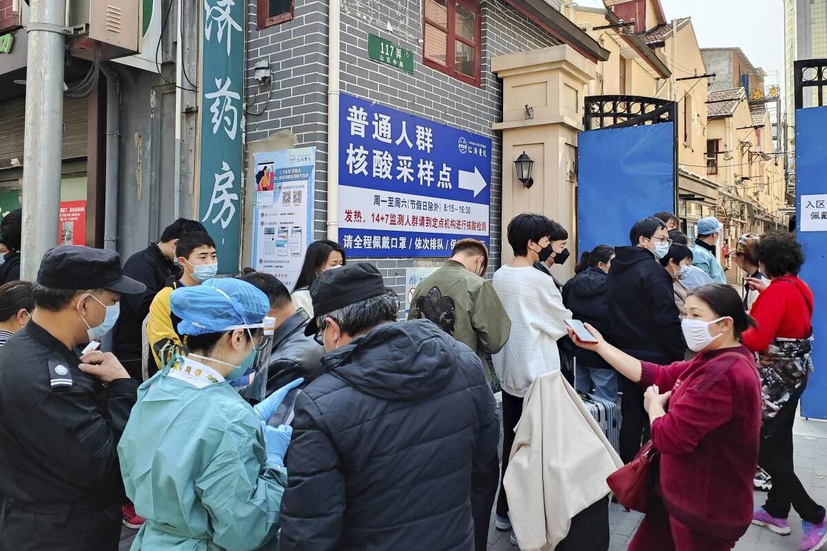 People waiting for coronavirus tests in Shanghai