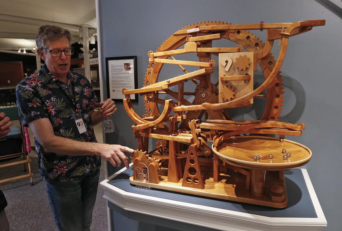 Wood sculptor Larry Marley talks about his piece "Gravity Well No. 9." 