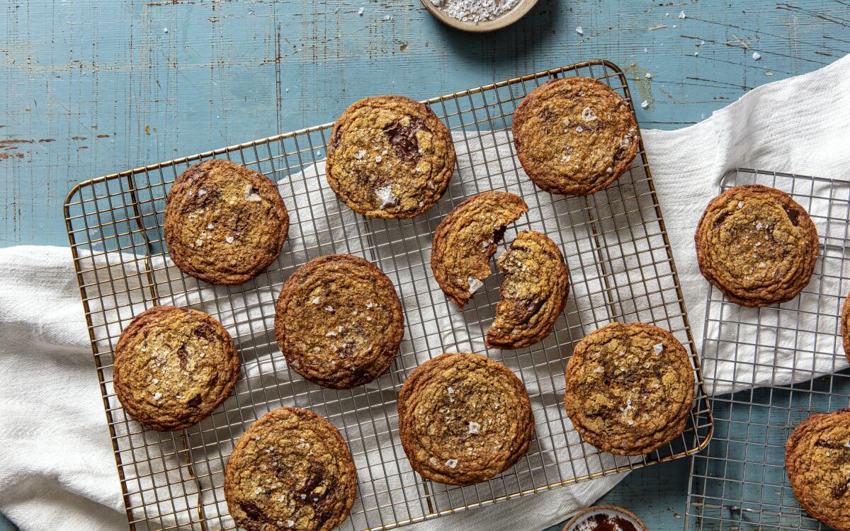 Brown butter espresso chocolate chip cookies cool on a rack.