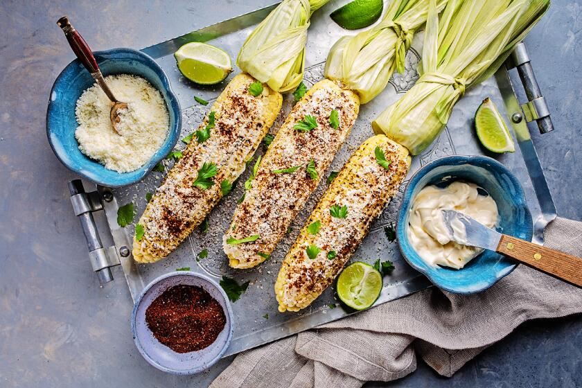 Mexican style grilled corn with mayo, chile and cotija cheese.