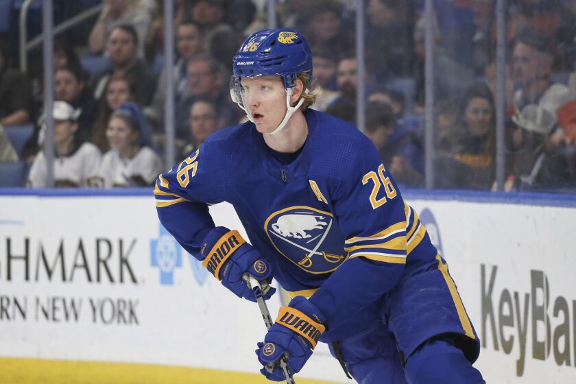 FILE - Buffalo Sabres defenseman Rasmus Dahlin (26) skates during the first period of an NHL hockey game against the New York Islanders on Saturday, April, 23, 2022, in Buffalo, N.Y. Once shy and timid, the Sabres 22-year-old defenseman and NHL's 2018 No. 1 draft pick arrived for the start of his fifth training camp in Buffalo brimming with confidence. (AP Photo/Joshua Bessex, File)