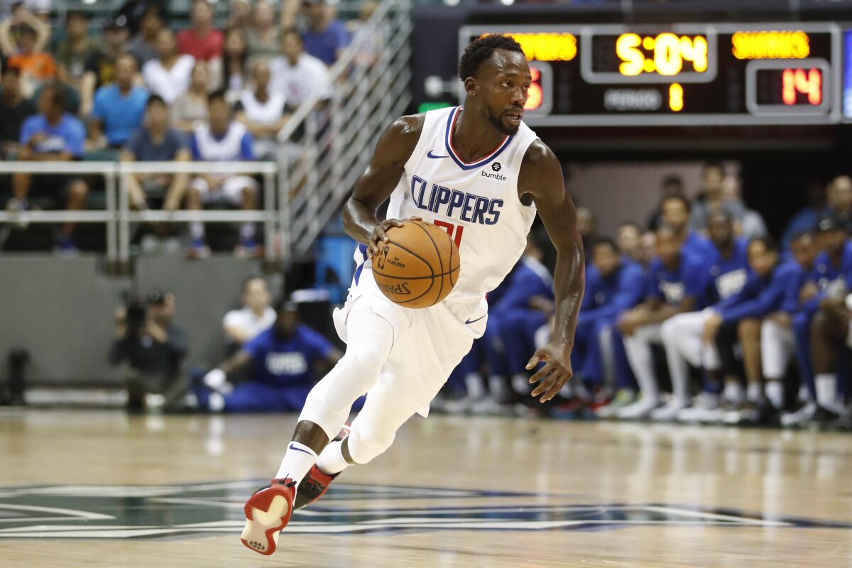 Clippers guard Patrick Beverley brings the ball upcourt against Sunday.