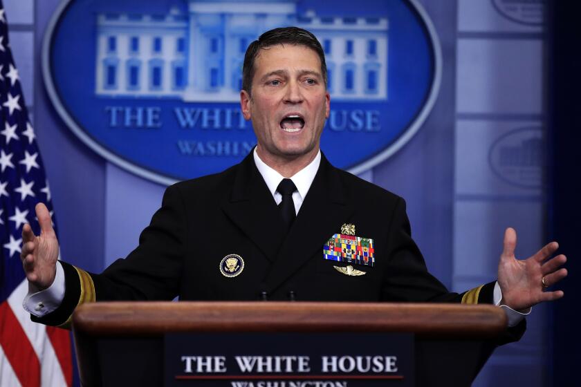 FILE - In this Jan. 16, 2018, file photo, then-White House physician Dr. Ronny Jackson speaks to reporters during the daily press briefing at the White House, in Washington. The Department of Defense inspector general has released a scathing report on the conduct of Ronny Jackson, now a congressman from Texas, when he worked as a top White House physician. (AP Photo/Manuel Balce Ceneta, File)