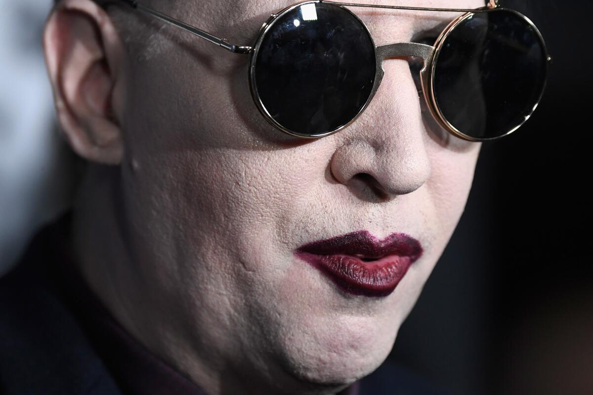 Marilyn Manson, as we know him best with makeup and no eyebrows, at the Hollywood premiere of "We Are X," a documentary about the band X Japan.