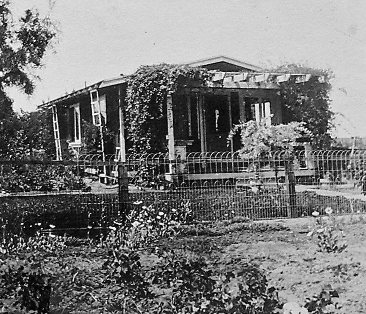 Ocean Beach's Wisteria Cottage, built in 1907 and first owned by John and Minnie Clarke, is pictured in 1921.