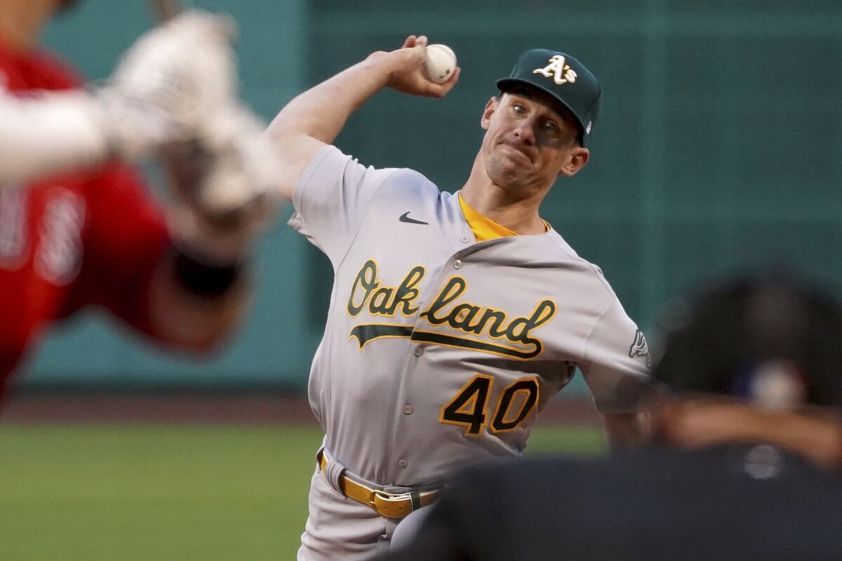 Oakland Athletics starter Chris Bassitt (40) pitches to a Boston Red Sox batter during the first inning of a baseball game Tuesday, May 11, 2021, in Boston. (AP Photo/Mary Schwalm)
