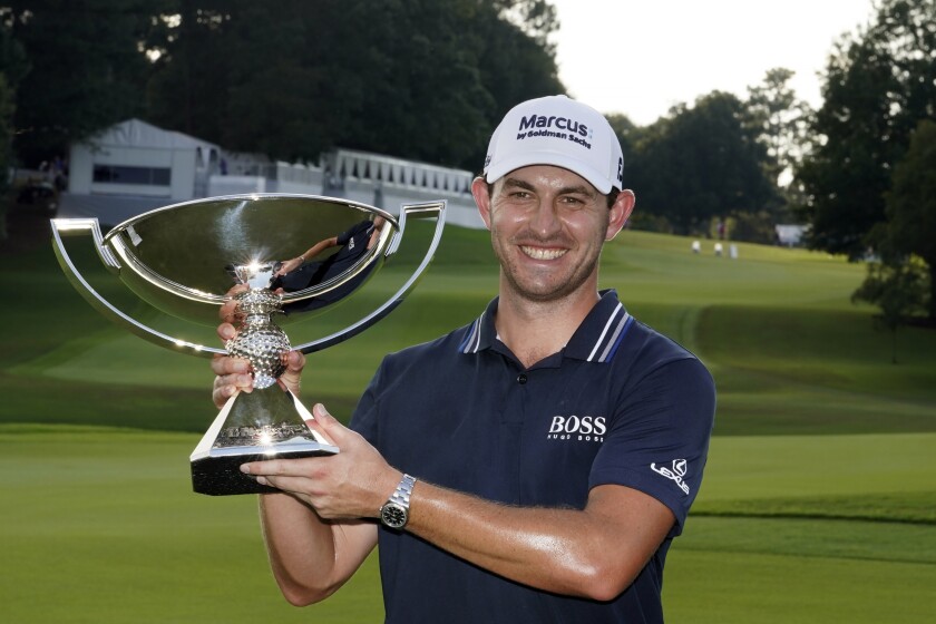 Patrick Cantlay celebrates after winning the Tour Championship.