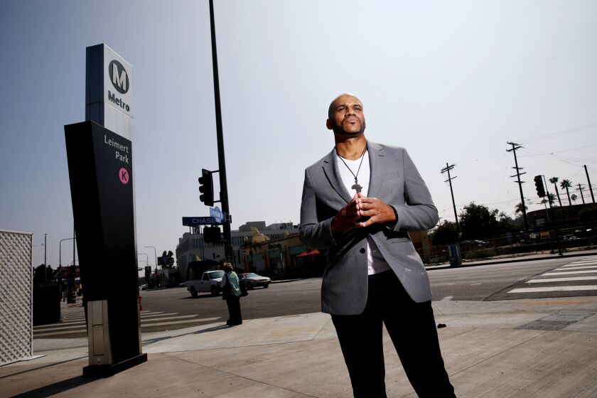 LOS ANGELES, CA - OCTOBER 06: Damien (cq) Goodmon (cq), 40, an adovocate and critic of the L.A. Metro K line at the Leimert Park station along Crenshaw Blvd. on Thursday, Oct. 6, 2022 in Los Angeles, CA. L.A. Metro K line, the 8½-mile line runs from the Adams District through the heart of historically Black Los Angeles and will eventually offer a path to connect to the Los Angeles Airport and the South Bay. (Gary Coronado / Los Angeles Times)