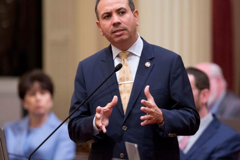 Sen. Tony Mendoza, D-Artesia, announces that he will take a month-long leave of absence while an investigation into sexual misconduct allegations against him are completed during the opening day of the Senate in Sacramento, Calif., Wednesday, Jan. 3, 2018. (AP Photo/Steve Yeater)