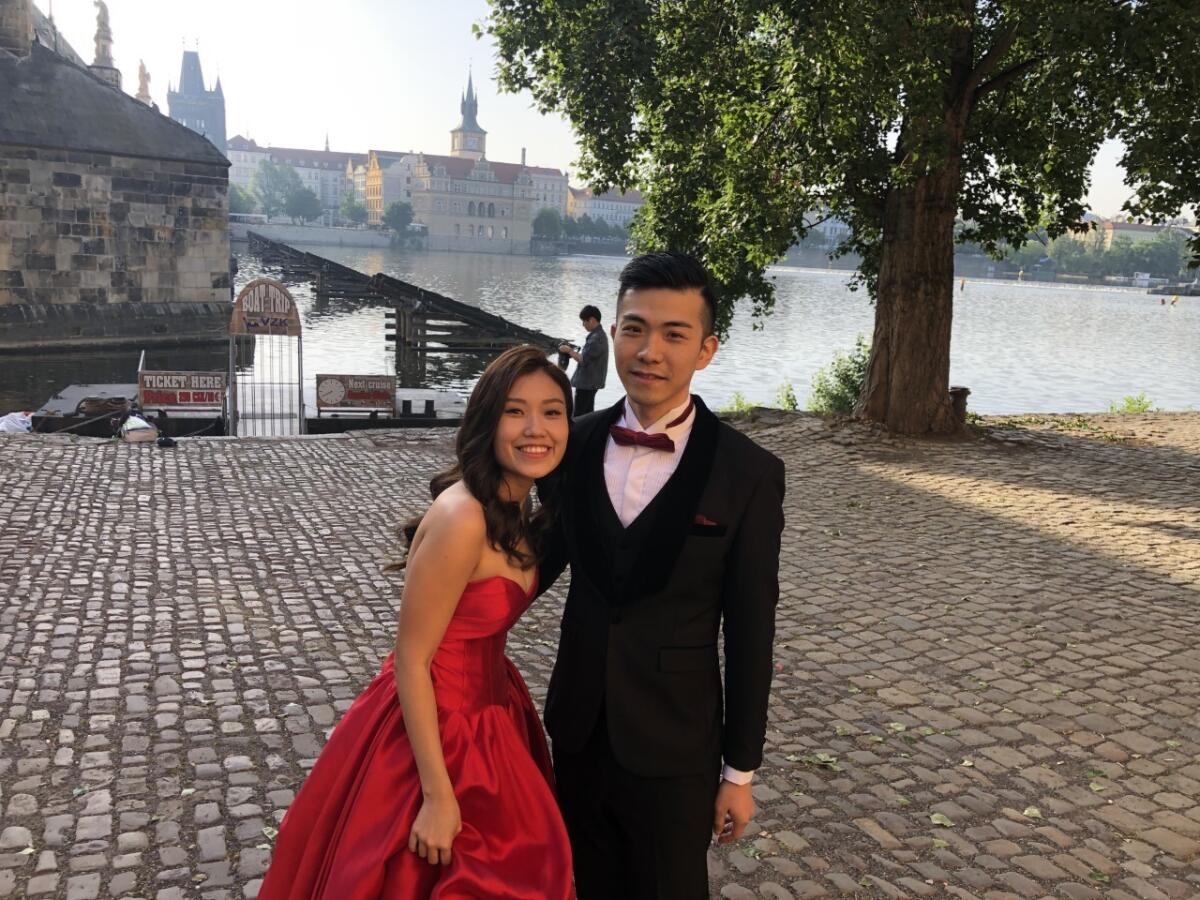 Erica Leung, 26, poses with her fiance Sze Sze, 28, for pre-wedding pictures in Prague. They are planning to get married in Hong Kong in November but took pre-wedding pictures in Prague.