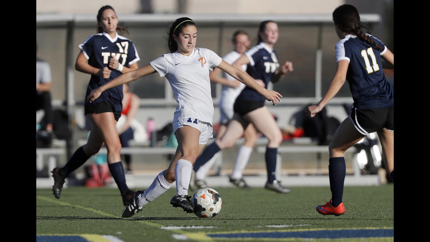 Pacifica Christian Orange County's Alyssa Smith dribbles the ball during the first half against Tarbut V’Torah in a San Joaquin League match at Vanguard University on Wednesday.