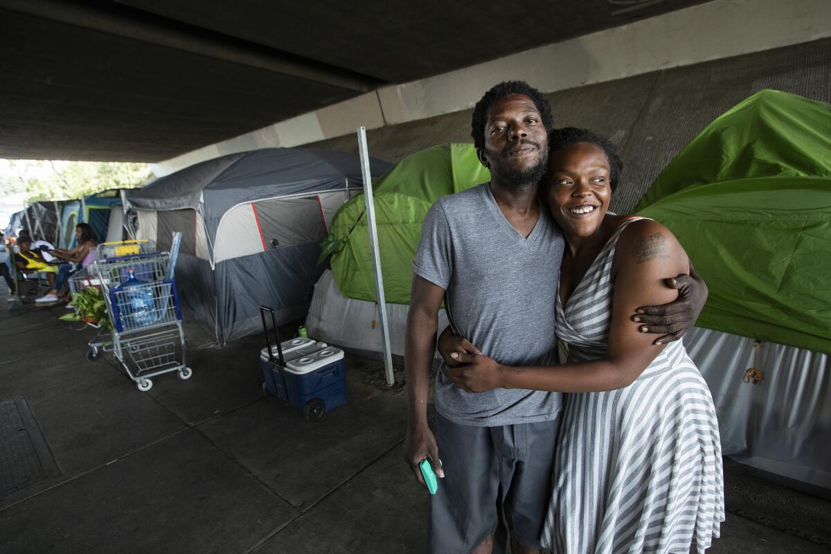 Michelle Vaughn and Edwin Williams under the Ronald Reagan Freeway in Pacoima