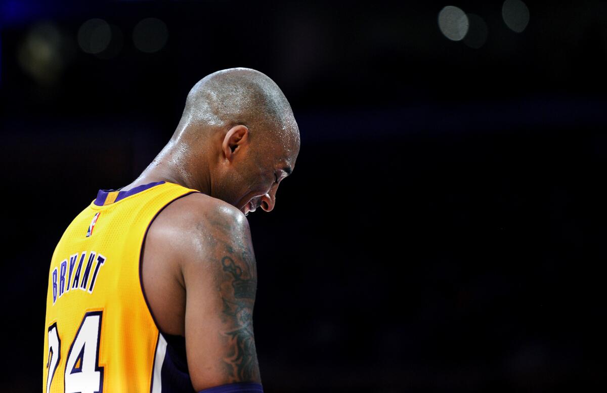Kobe Bryant takes a moment to catch his breath during his final game against the Utah Jazz.