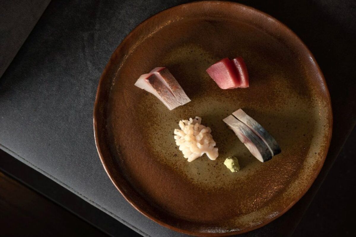 Onodera serves sashimi on ceramics he made himself