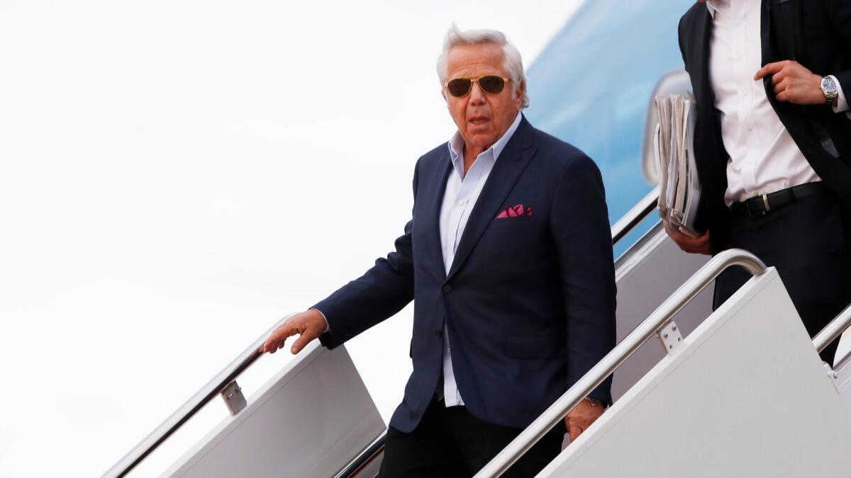 New England Patriots owner Robert Kraft disembarks Air Force One at Andrews Air Force Base, Md., on March 19.