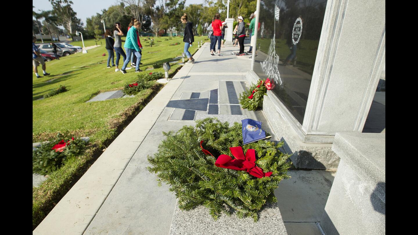 Photo Gallery: Christmas wreaths for veterans at Pacific View cemetery