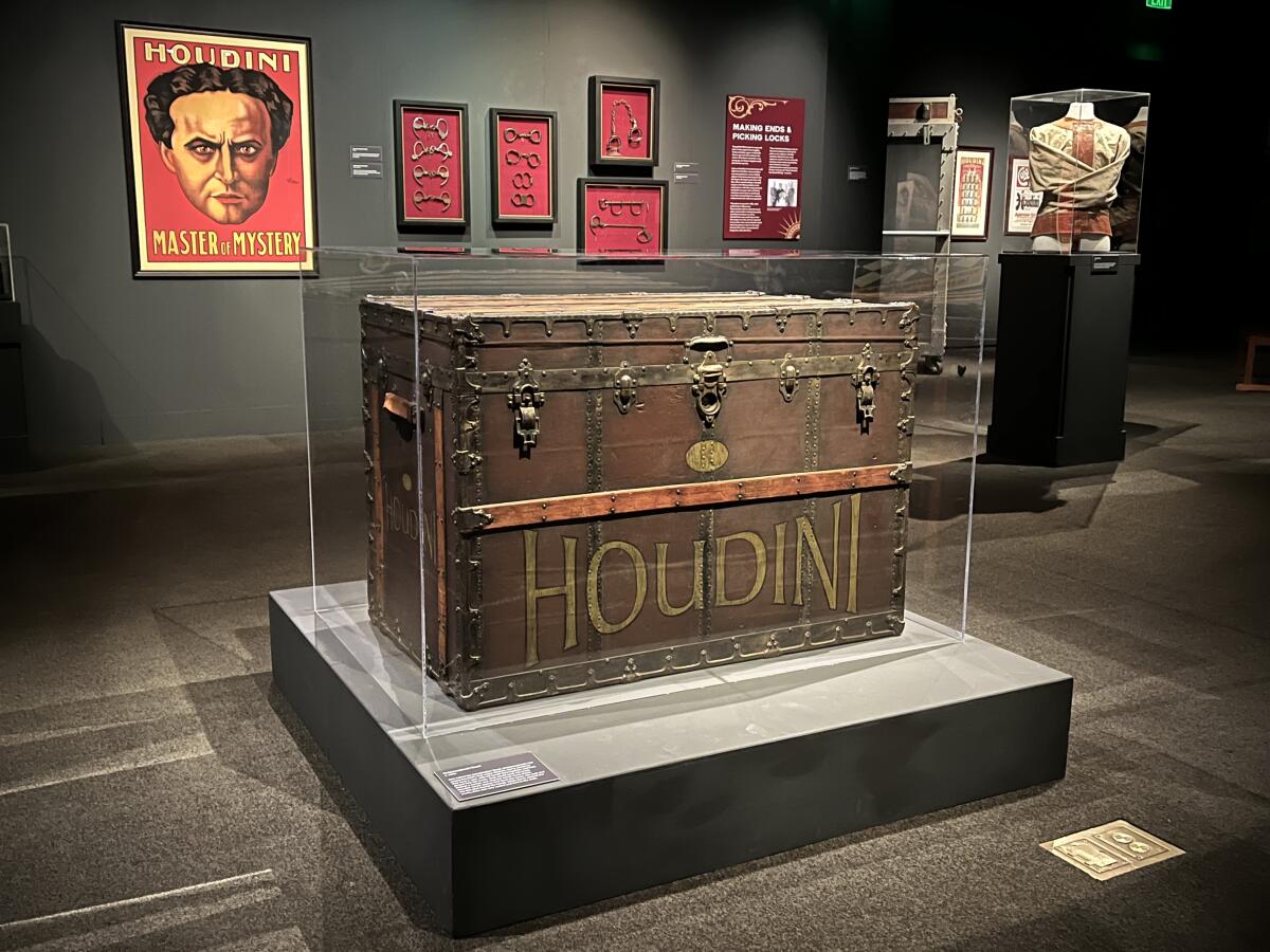 The Metamorphosis trunk and handcuffs used by illusionist Harry Houdini.