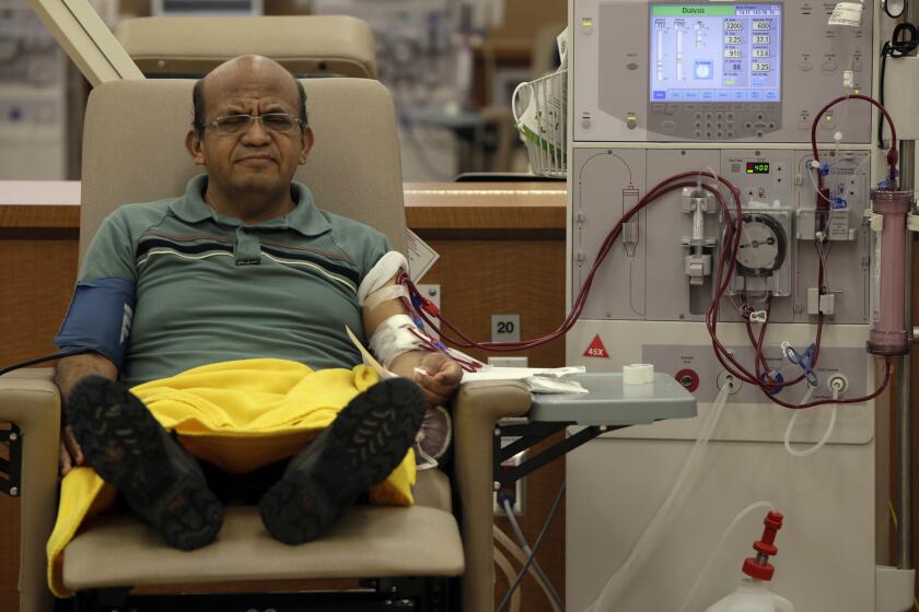 INGLEWOOD, CA. AUGUST 28, 2014 --- Giraldo Garcia, 54, gets dialysis at DaVita Dialysis Center on August 28, 2014 in Inglewood. (Irfan Khan / Los Angeles Times)