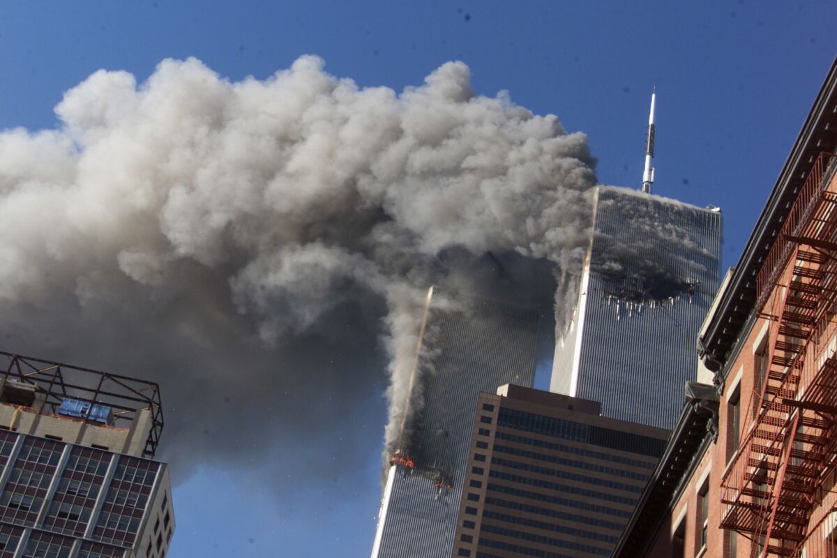 Smoke rising from the burning twin towers of the World Trade Center on 9/11.