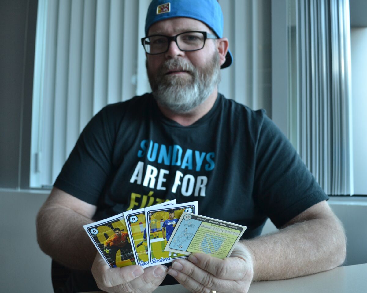 San Diego native Travis Peterson has been a sports card collector since he was a child and counts tens of thousands of cards in his collection.